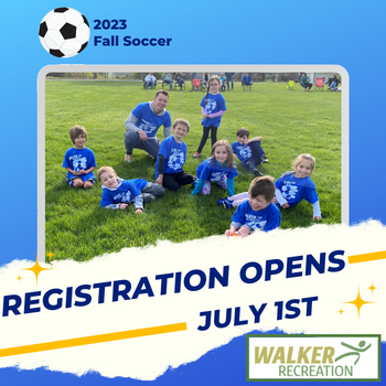 blue background with group of youth soccer players sitting on grass